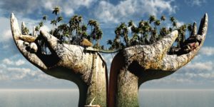 two hands painted like a globe. the hands are holding up palm trees and huts.